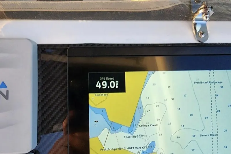 Slide: The Image of GPS display on Walker Bay WB 22 showing speed of 49.0 MPH, 2023 model. - 6