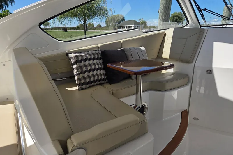 Slide: The Image of Luxurious seating area on a 2020 Pursuit DC 365 Dual Console boat. - 39