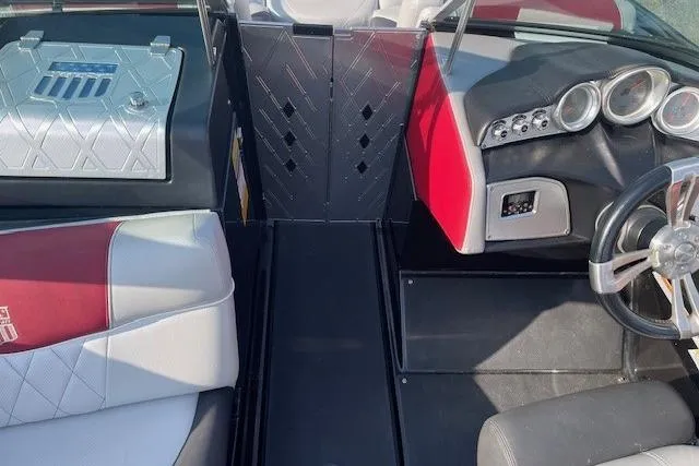 Slide: The Image of Dashboard of a 2013 MasterCraft X-25 boat displaying air and water temperatures. - 12