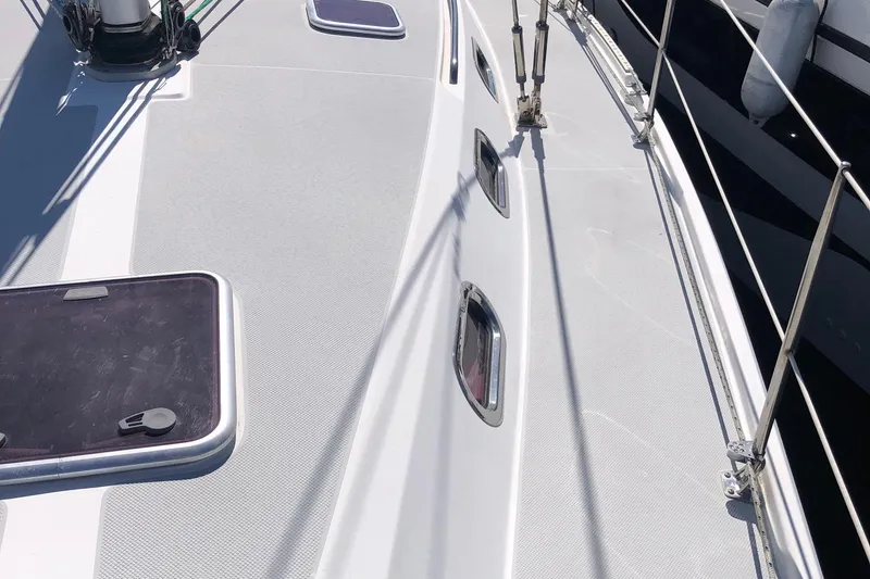Slide: The Image of Deck view of a 2008 Catalina 42 MkII sailboat, featuring hatches and rigging. - 15