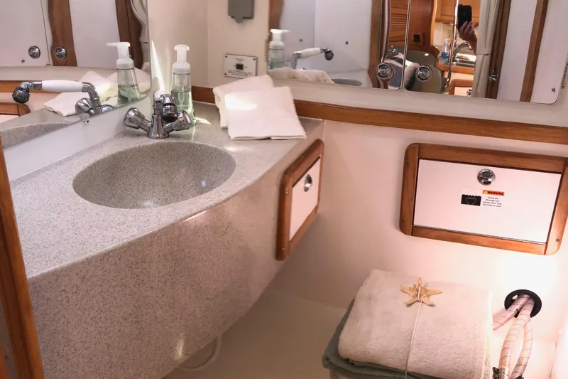 Slide: The Image of Bathroom interior of 2008 Catalina 42 MkII yacht with sink and mirror. - 8