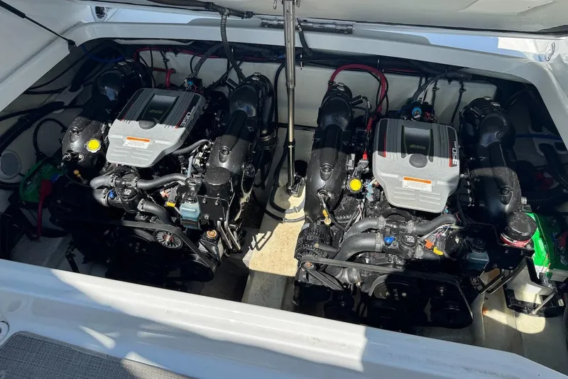 Slide: The Image of 2015 Formula 310 Bowrider engine compartment with dual powerful engines. - 12