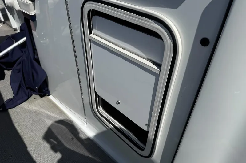 Slide: The Image of 2015 Formula 310 Bowrider storage compartment with sleek design and durable finish. - 20