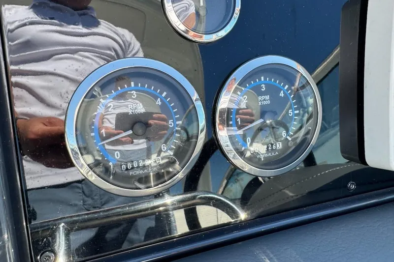 Slide: The Image of Close-up of 2015 Formula 310 Bowrider RPM gauges on dashboard. - 30