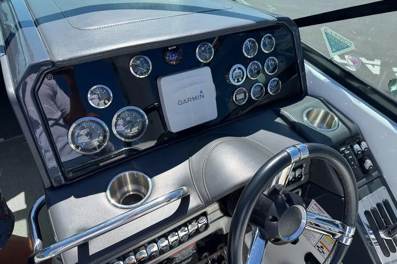 Slide: The Image of Dashboard of a 2015 Formula 310 Bowrider with Garmin navigation system and gauges. - 5