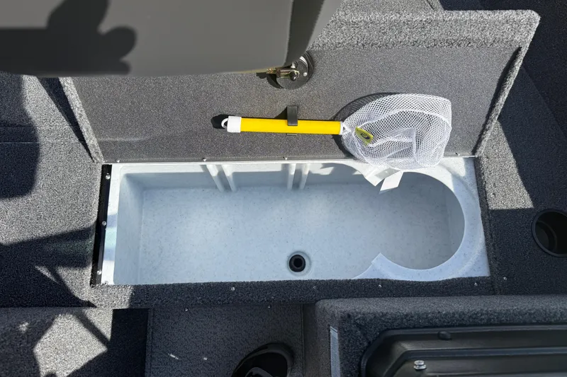 Slide: The Image of Battery compartment of 2026 Lund 1650 Rebel XL Sport boat, featuring secure wiring. - 9