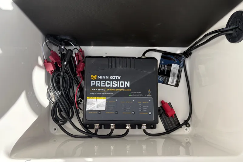 Slide: The Image of Minn Kota Precision MK 440PC1 on-board battery charger in 2026 Lund 185 Impact GL boat. - 15
