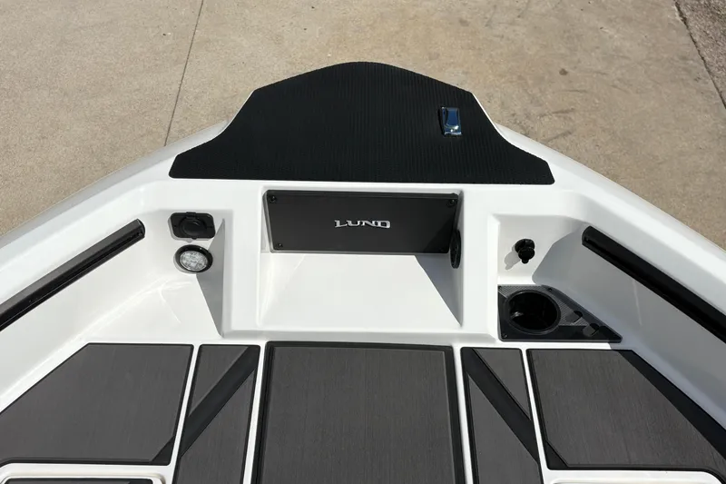 Slide: The Image of 2026 Lund 185 Impact GL boat deck with sleek design and modern features. - 9