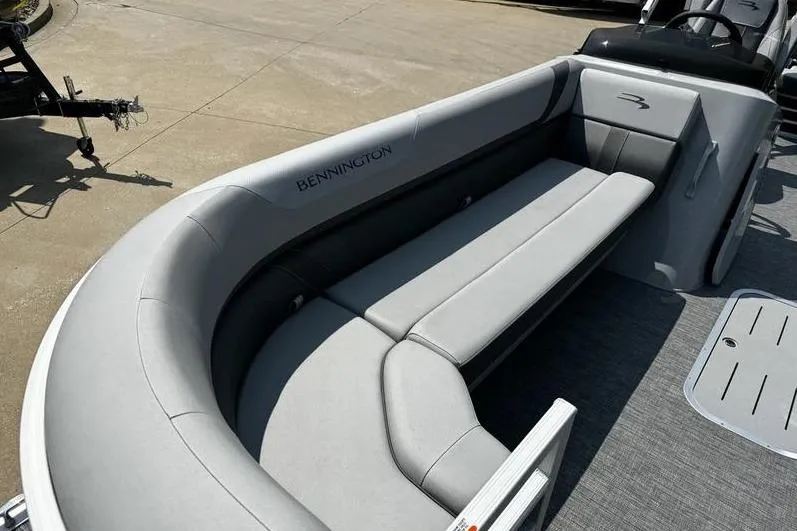 Slide: The Image of 2025 Bennington 25 SXSB boat with sleek gray seating and modern design. - 10