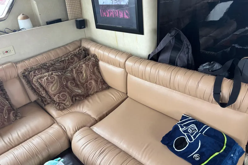 Slide: The Image of Luxurious beige leather seating in 1986 Maiora Phantom yacht interior. - 20