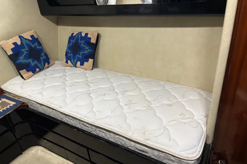 Slide: The Image of Cozy cabin bed with patterned pillows in 1986 Maiora Phantom yacht. - 24