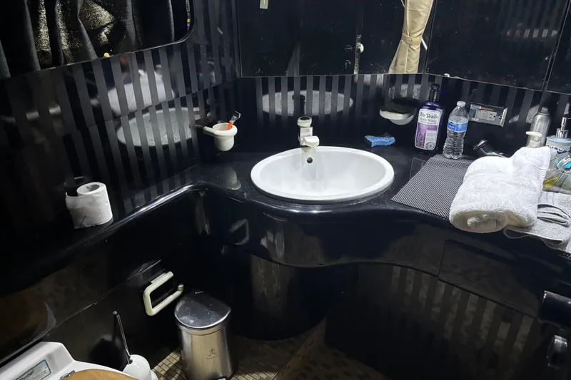 Slide: The Image of Luxurious bathroom in a 1986 Maiora Phantom yacht with modern amenities. - 32