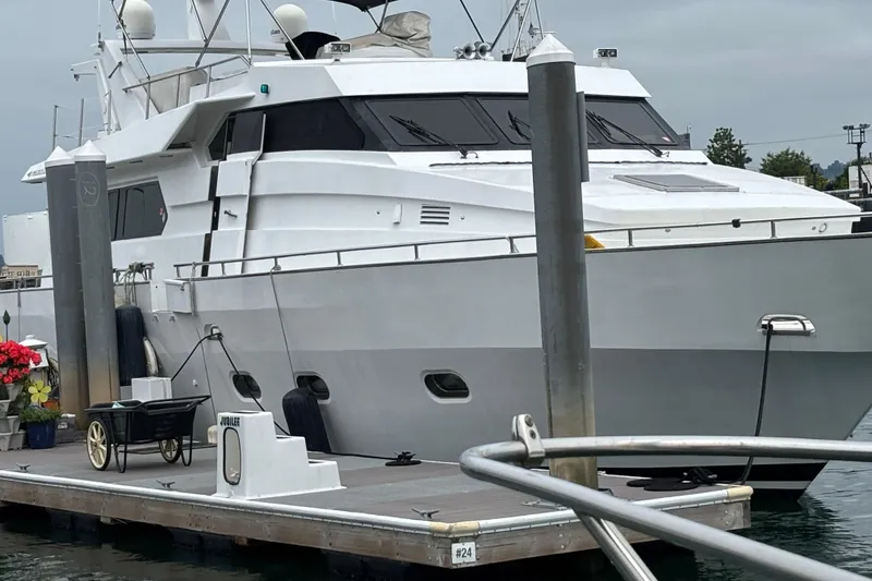 Slide: The Image of Luxury Maiora Phantom yacht docked at marina, 1986 model. - 7