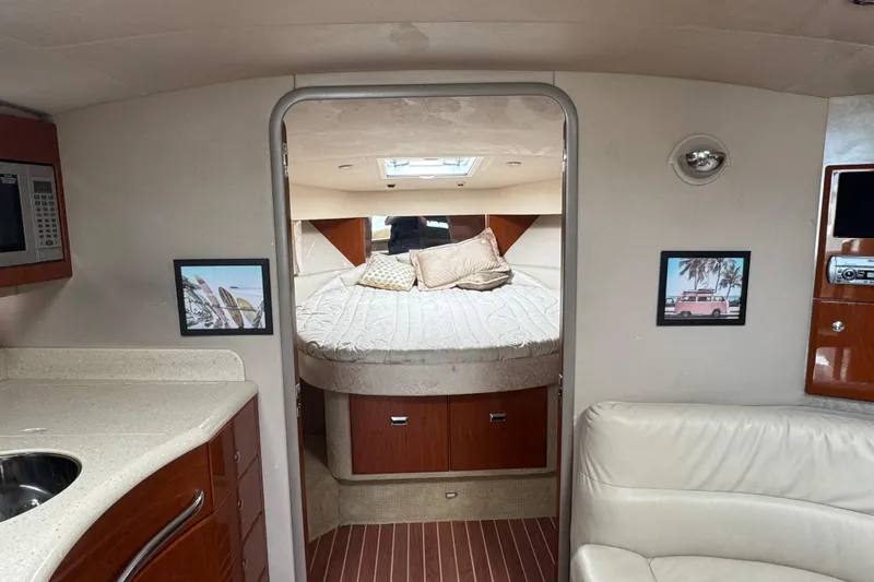 Slide: The Image of Interior of 2006 Formula 40 Performance Cruiser with cozy bed and modern amenities. - 20