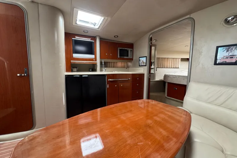 Slide: The Image of Interior of 2006 Formula 40 Performance Cruiser with wood finishes and modern amenities. - 22