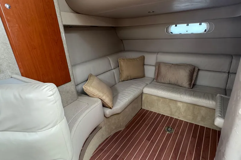 Slide: The Image of 2006 Formula 40 Performance Cruiser interior with beige leather seating and wood accents. - 25