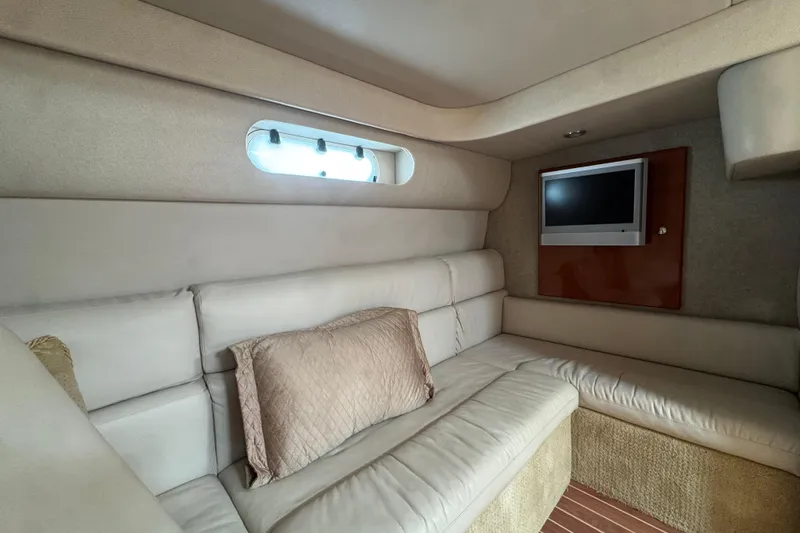 Slide: The Image of Interior of 2006 Formula 40 Performance Cruiser with beige seating and wall-mounted TV. - 43