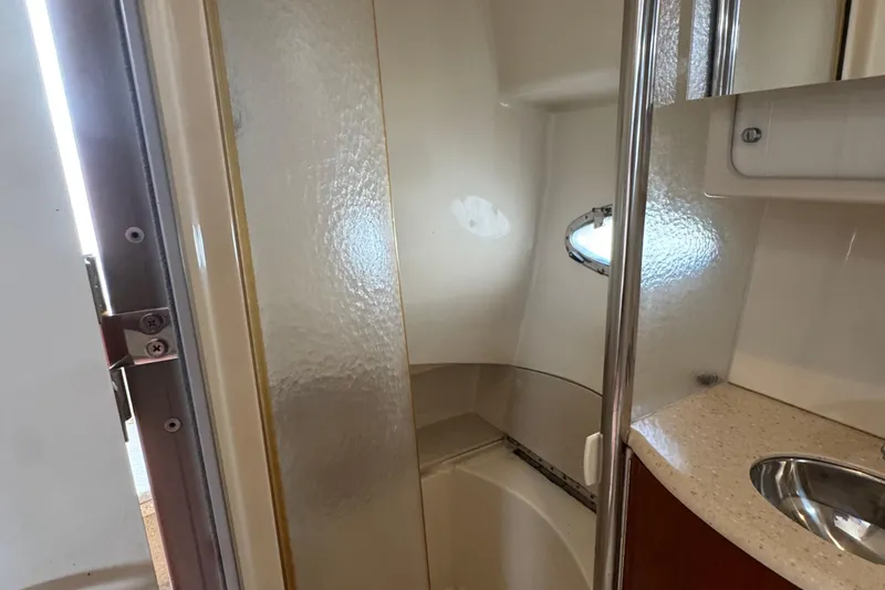 Slide: The Image of Interior of 2006 Formula 40 Performance Cruiser bathroom with shower and sink. - 45