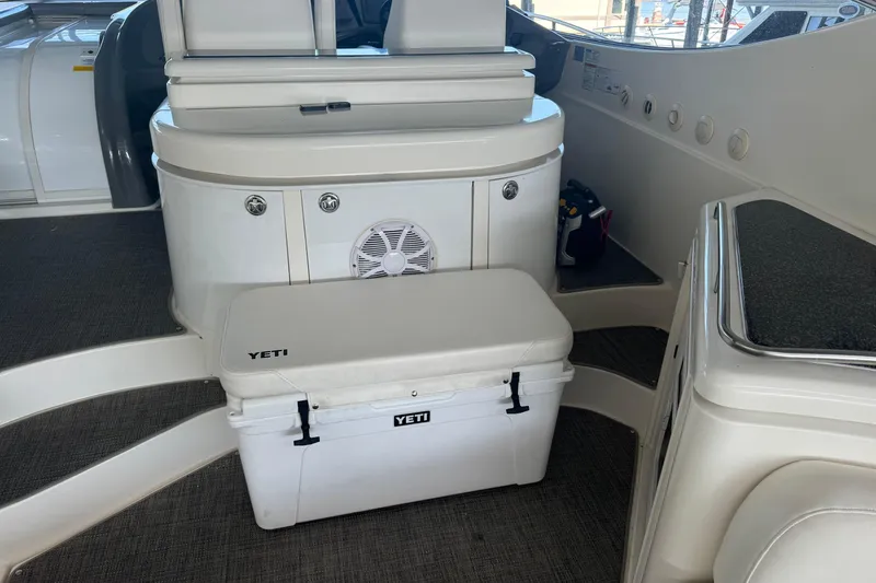 Slide: The Image of 2006 Cruisers Yachts 560 Express interior with Yeti cooler on deck. - 7