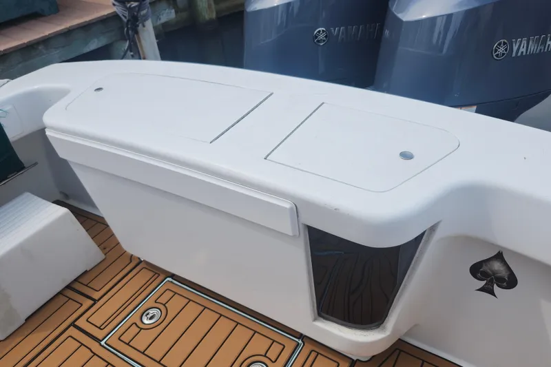 Slide: The Image of 2003 Shearline 30 Express boat deck with Yamaha engines and spade decal. - 36