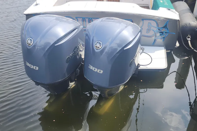 Slide: The Image of Twin Yamaha 300 outboard engines on a 2003 Shearline 30 Express boat. - 44