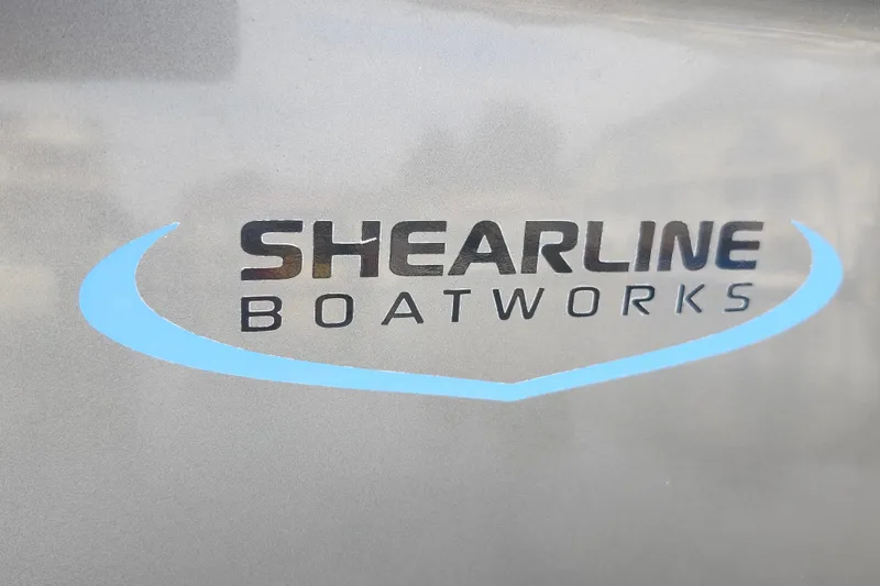 Slide: The Image of Shearline Boatworks logo on 2003 Shearline 30 Express boat. - 47