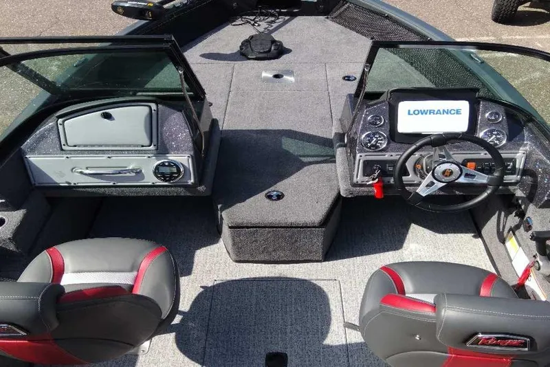 Slide: The Image of 2024 Ranger VS1782SC Angler boat interior with steering wheel and Lowrance display. - 2