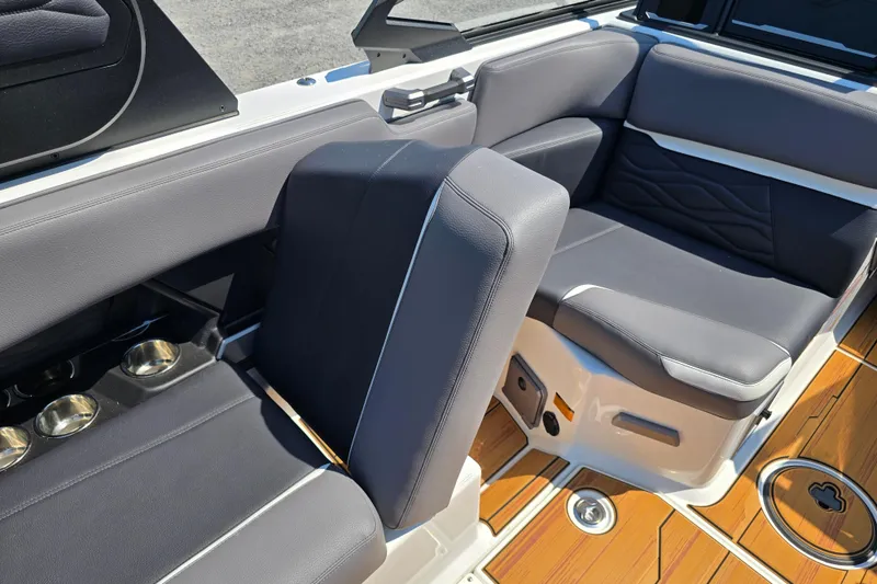 Slide: The Image of Luxurious interior of 2026 Supra SA boat with sleek seating and cup holders. - 15