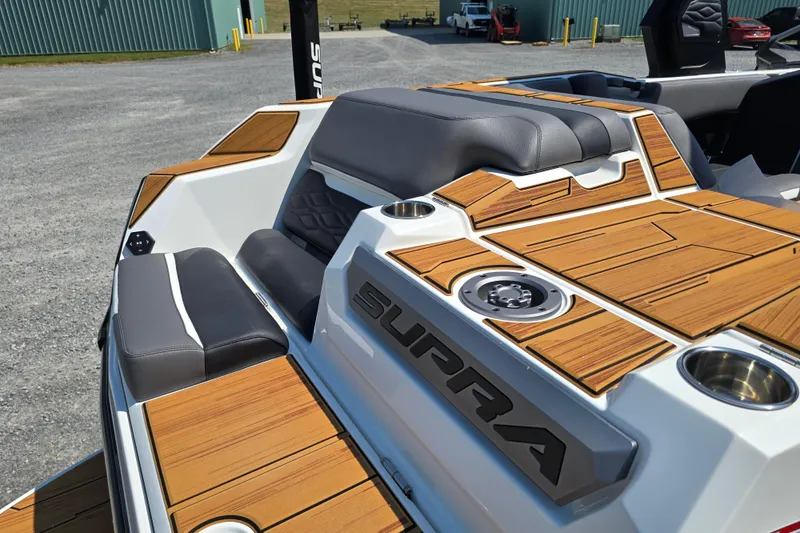 Slide: The Image of 2026 Supra SA boat interior with sleek seating and modern design elements. - 8
