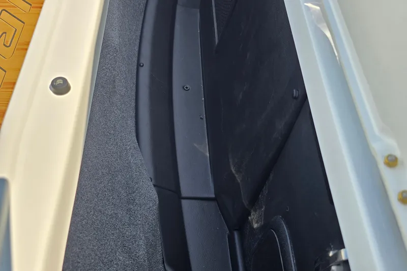 Slide: The Image of 2026 Supra SA interior detail showing storage compartment and textured surfaces. - 9