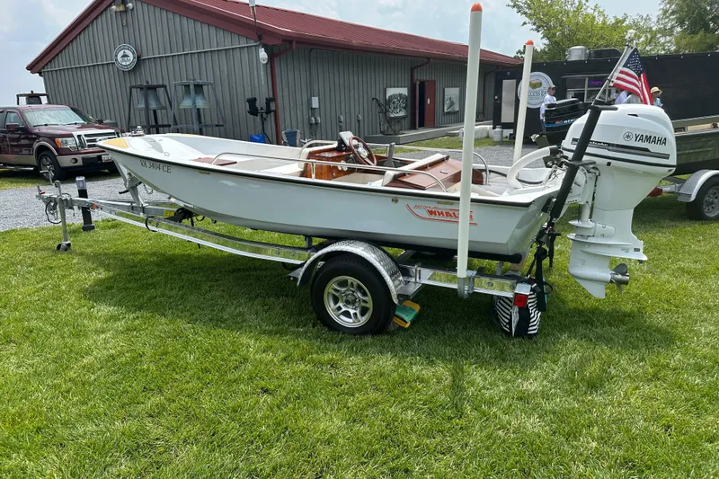 Slide: The Image of 1981 Boston Whaler 13 Super Sport boat on trailer with Yamaha outboard motor. - 10