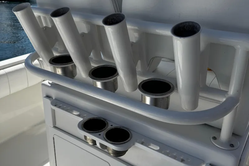 Slide: The Image of Rod holders on a 2015 Regulator 28 Forward Seating boat, designed for fishing enthusiasts. - 14