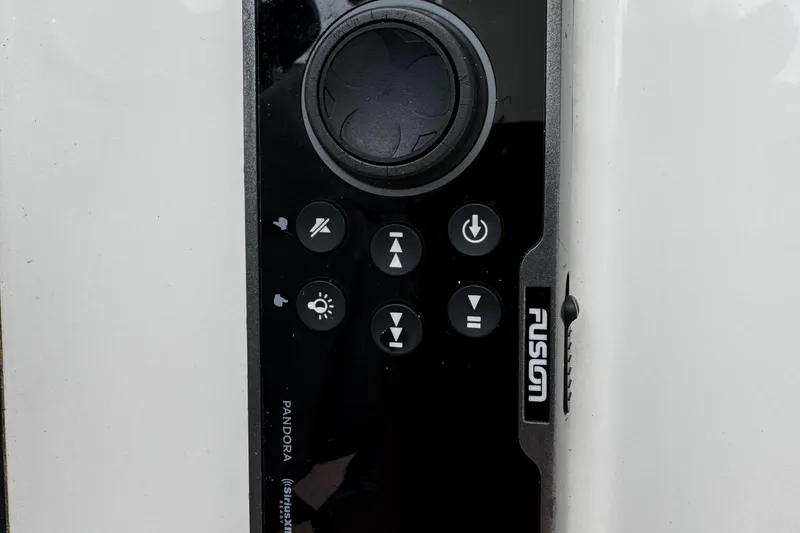 Slide: The Image of Fusion audio control panel on 2015 Regulator 28 Forward Seating boat. - 37