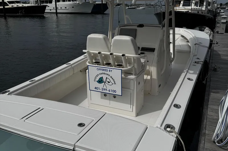 Slide: The Image of 2015 Regulator 28 Forward Seating boat docked, offered by Oyster Harbors Marine. - 38