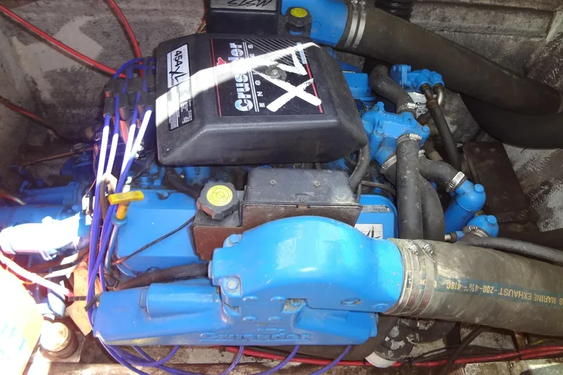 Slide: The Image of Engine of a 1995 Harbor Master 52 boat, featuring Crusader XL components. - 46