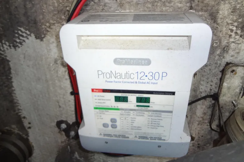 Slide: The Image of ProNautic 12:30P charger in 1995 Harbor Master 52 boat, mounted on wall. - 48