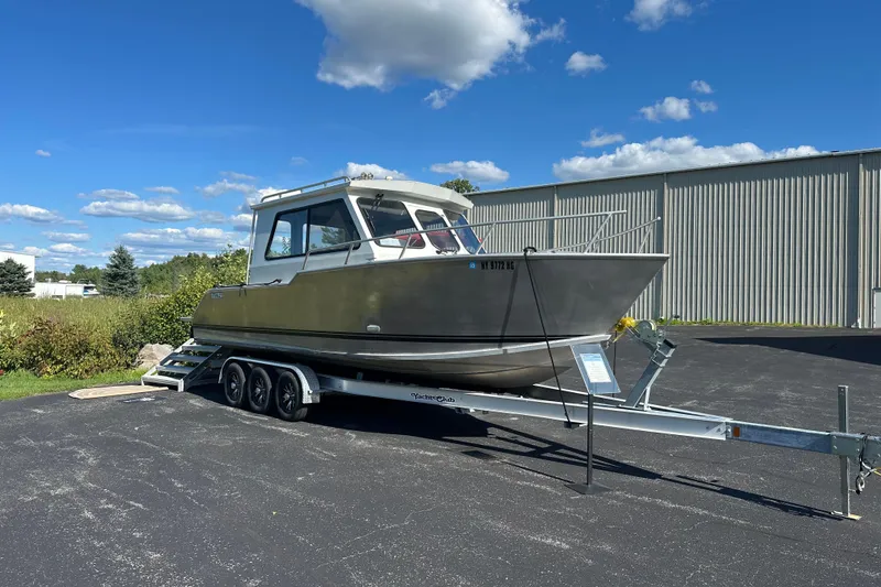 Slide: The Image of 2018 Stanley 27 Custom boat on trailer under clear blue sky. - 0