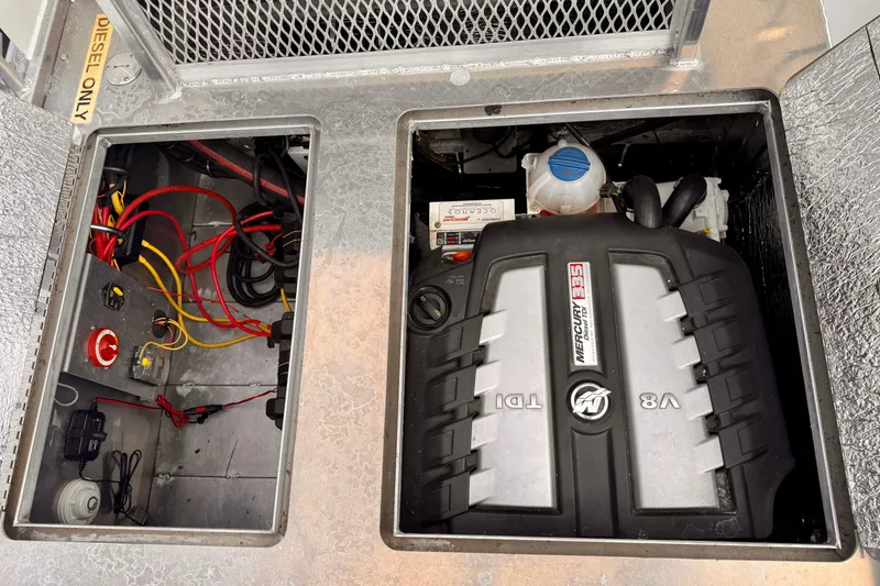 Slide: The Image of Engine compartment of a 2018 Stanley 27 Custom boat with Mercury V8 TDI engine. - 15