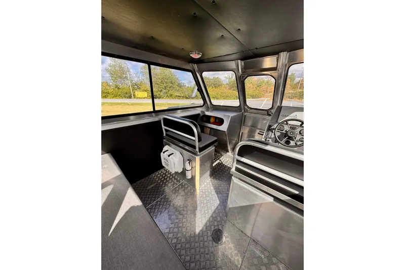 Slide: The Image of Interior of 2018 Stanley 27 Custom boat with steering wheel and windows. - 3