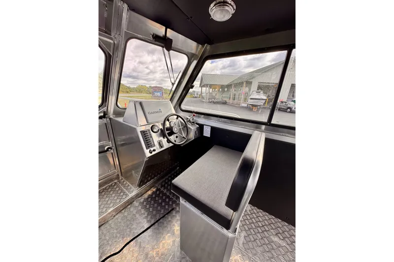 Slide: The Image of Interior of 2018 Stanley 27 Custom boat with Garmin navigation system. - 8