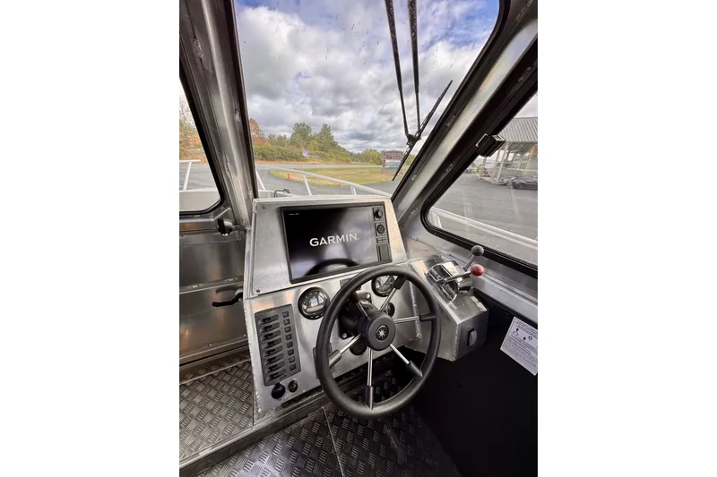 Slide: The Image of Interior of a 2018 Stanley 27 Custom boat with Garmin navigation system. - 9