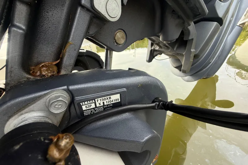 Slide: The Image of Close-up of a 2018 Key West 219 FS boat's Yamaha F150XB engine label. - 28