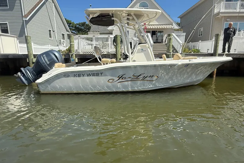Slide: The Image of 2018 Key West 219 FS boat docked near waterfront homes. - 30
