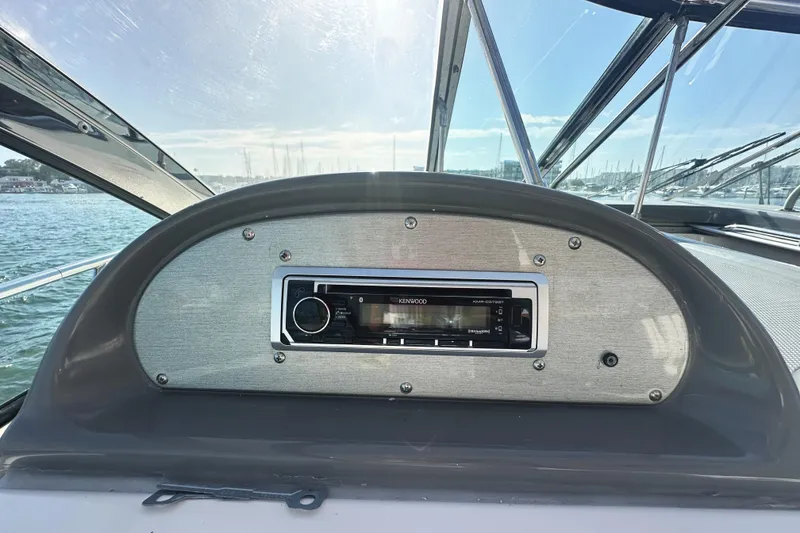 Slide: The Image of Dashboard of 2007 Cruisers Yachts 540 Express with Kenwood stereo system. - 20
