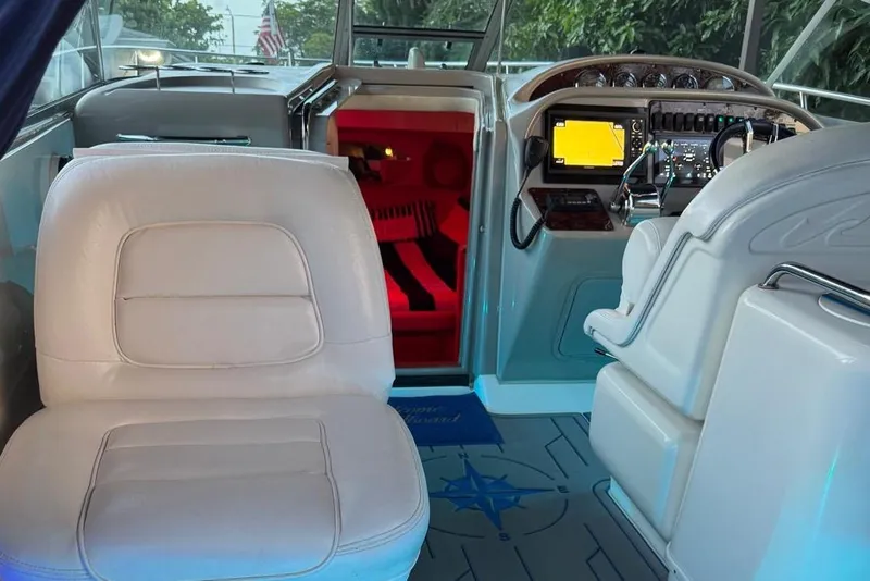 Slide: The Image of Control panel of a 2006 Sea Ray 290 Amberjack boat with Garmin navigation system. - 10