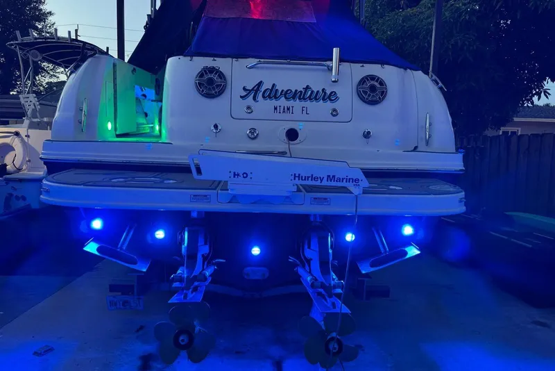 Slide: The Image of 2006 Sea Ray 290 Amberjack boat interior with illuminated flooring and seating. - 5