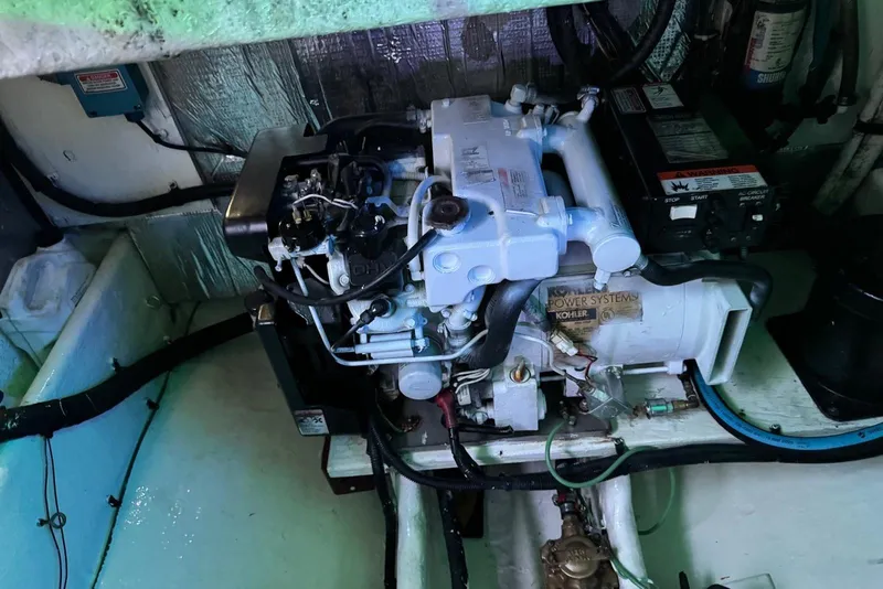 Slide: The Image of 2006 Sea Ray 290 Amberjack boat interior with helm, seating, and navigation equipment. - 7