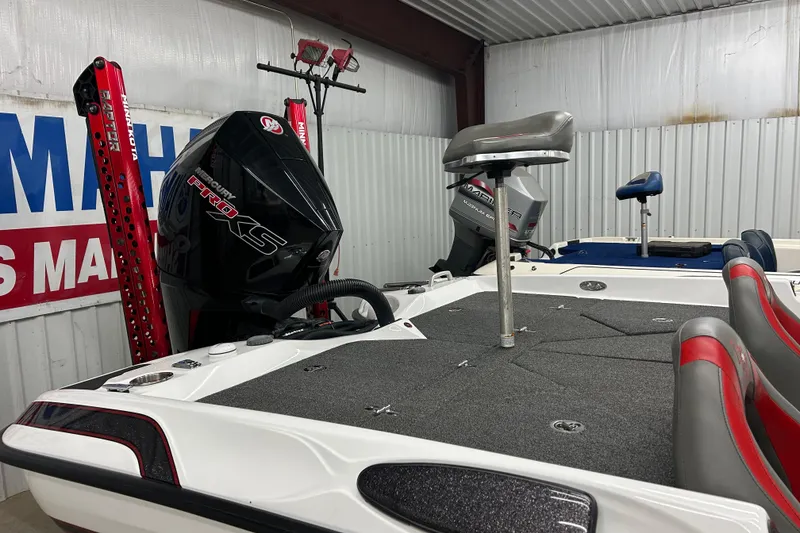 Slide: The Image of 2023 Bass Cat Eyra boat with Mercury Pro XS engine in showroom. - 8