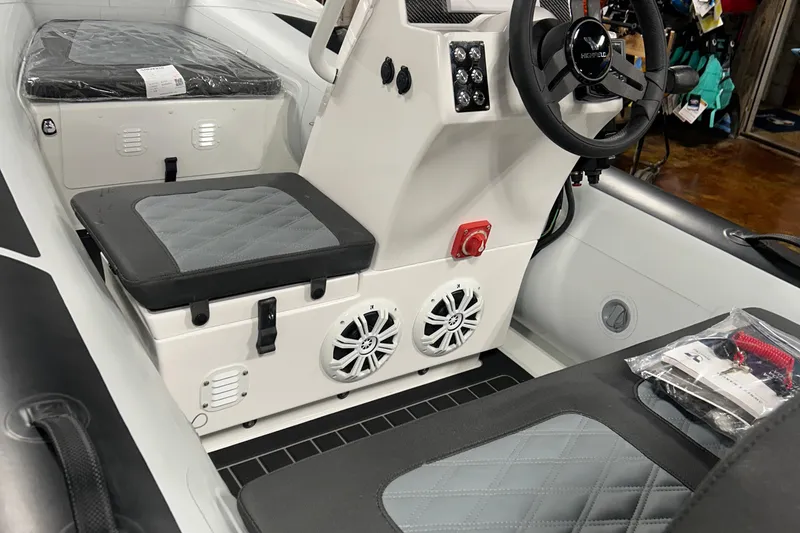 Slide: The Image of 2026 Highfield Sport 360 boat with Tohatsu engine on display. - 6