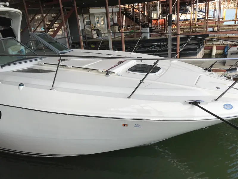 Slide: The Image of 2008 Sea Ray 330 Sundancer boat docked in marina. - 4